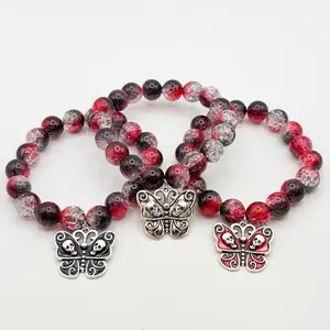 ST Take me back to Eden song inspired bead bracelet winged insect, black,crimson, and white crackle acrylic bead