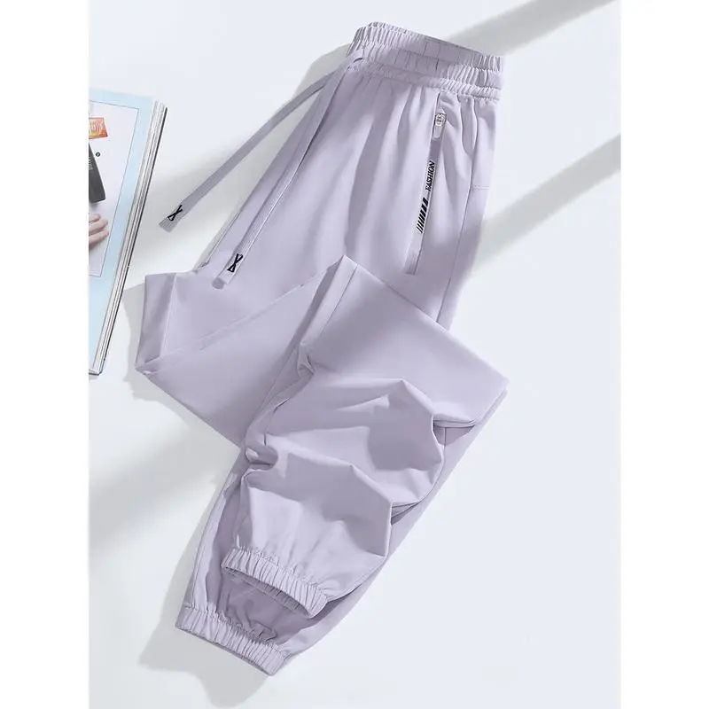 Women's High-Stretch Nylon Joggers - Casual Sports Pants with Elastic Waistband, Cuffed Ankles, and Side Pockets, Breathable Knit Fabric for Spring & Summer, Summer Joggers | Cuffed Ankle Pants | Breathable Fabric Women's High-Stretch Nylon Joggers - Casual Sports Pants with Elastic Waistband, Cuffed Ankles, and Side Pockets, Breathable Knit Fabric for Spring & Summer, Summer Joggers | Cuffed Ankle Pants | Breathable Fabric