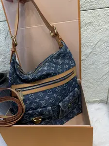 Pre-owned Louis Vuitton Denim Monogram Hobo Bag with Gold Hardware and Adjustable Strap