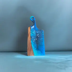 The Crafted Edge cutting board hand crafted with resin and live edge wood coastal colors wall art serving board charcuterie