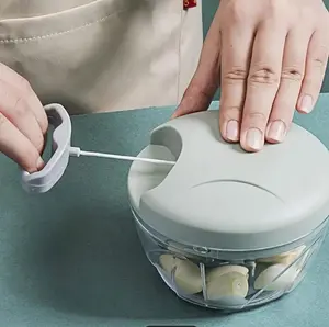 Manual Food Chopper Garlic Pillar and Chopper Vegetable Cutter Efficient Kitchen Tool for Easy Food Preparation with Sharp Stainless Steel Blades and Durable Transparent Bowl