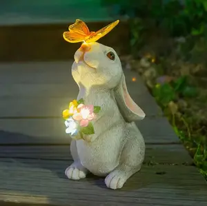 Outdoor rabbit hand-held flower statues, solar butterfly lights, resin art deco rabbit statues for gardens, lawns, yards, yard decorations, the perfect holiday gift, Mother's Day, Halloween, Christmas