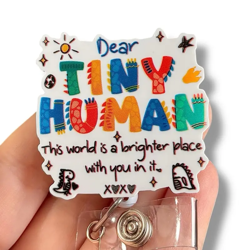 Glitter My Badge tiny human badge reel for nurse and hospital workers. Badge clip Badge pull - Retractable swivel clip with a 360 rotation. Great gift for coworkers. Funny badge reels