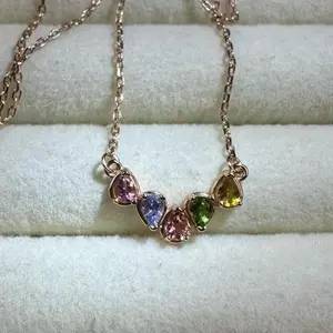 <PingEast Jewelry> Multi gem stones necklace —925 Sterling Silver Smile Pendant Necklace set with five eye-clean multicolor tourmaline stones. Delicate, playful design with vibrant sparkle. Comes with a certificat