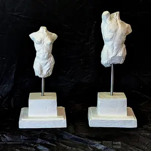 The Possession pair- Make and female torsos in plaster