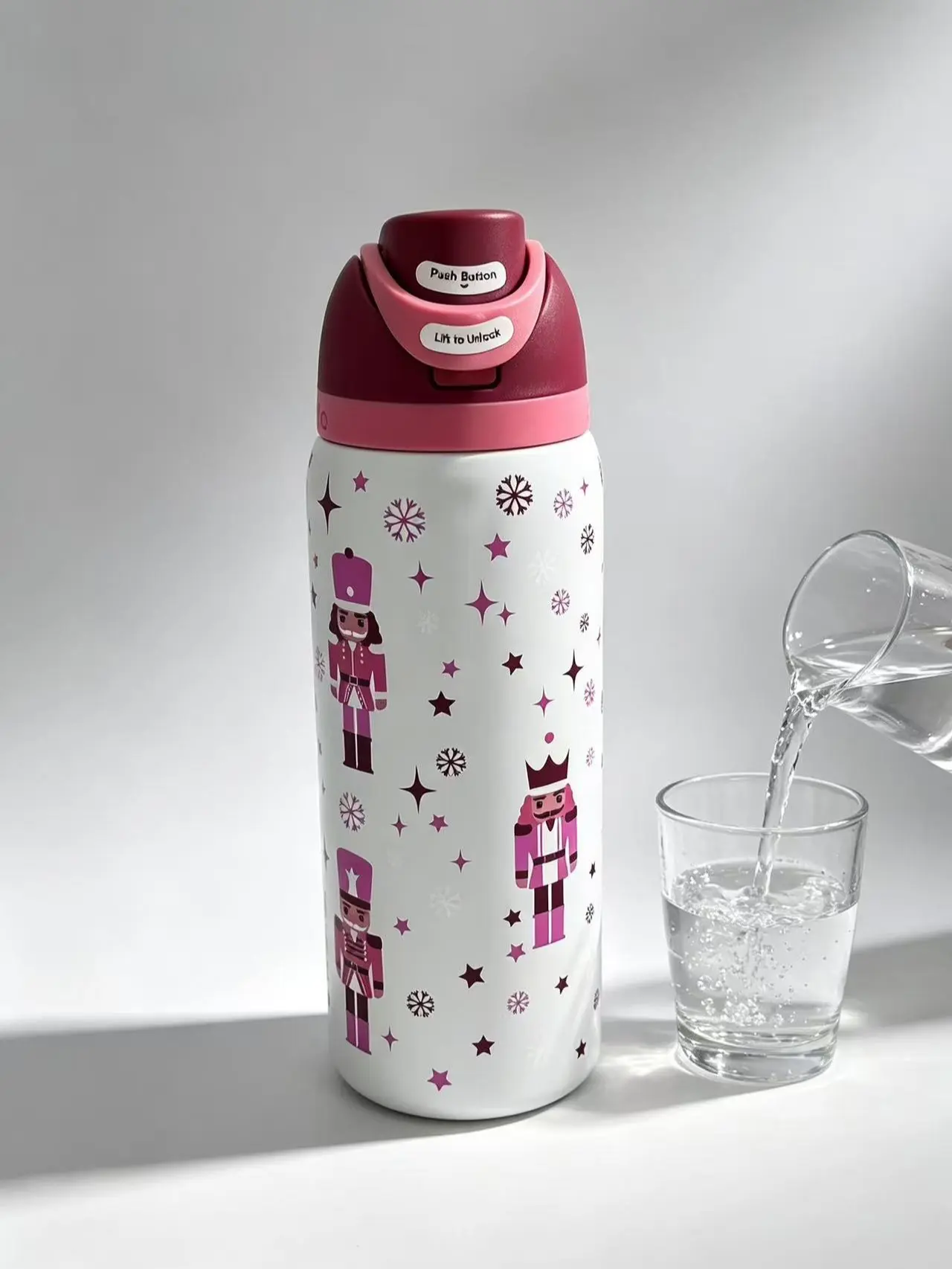 Owala FreeSip Limited Edition Nutcracker Insulated Water Bottle 24oz, Pink Christmas Soldier Snowflake Stainless Steel Tumbler, Leakproof Lockable Flip Lid, BPA-Free Cold Keeping Sports Travel Cup for Holiday Gift School Gym, Flasks, Stylish