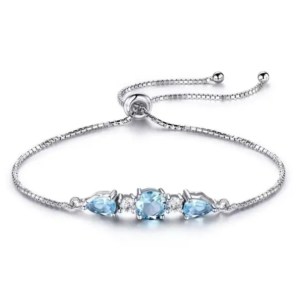 IRAMAT 925 Sterling Silver Sky Blue Topaz Tennis  charm  Bracelet - Adjustable Fine Jewelry for Women - Perfect Gift for Weddings & Parties