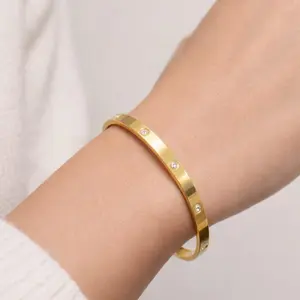 Elegant Gold Bangle with cz stones