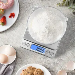 High-precision digital kitchen scale that measures grams and ounces—essential for cooking, baking, and meal prep; perfect for apartments and dorms.