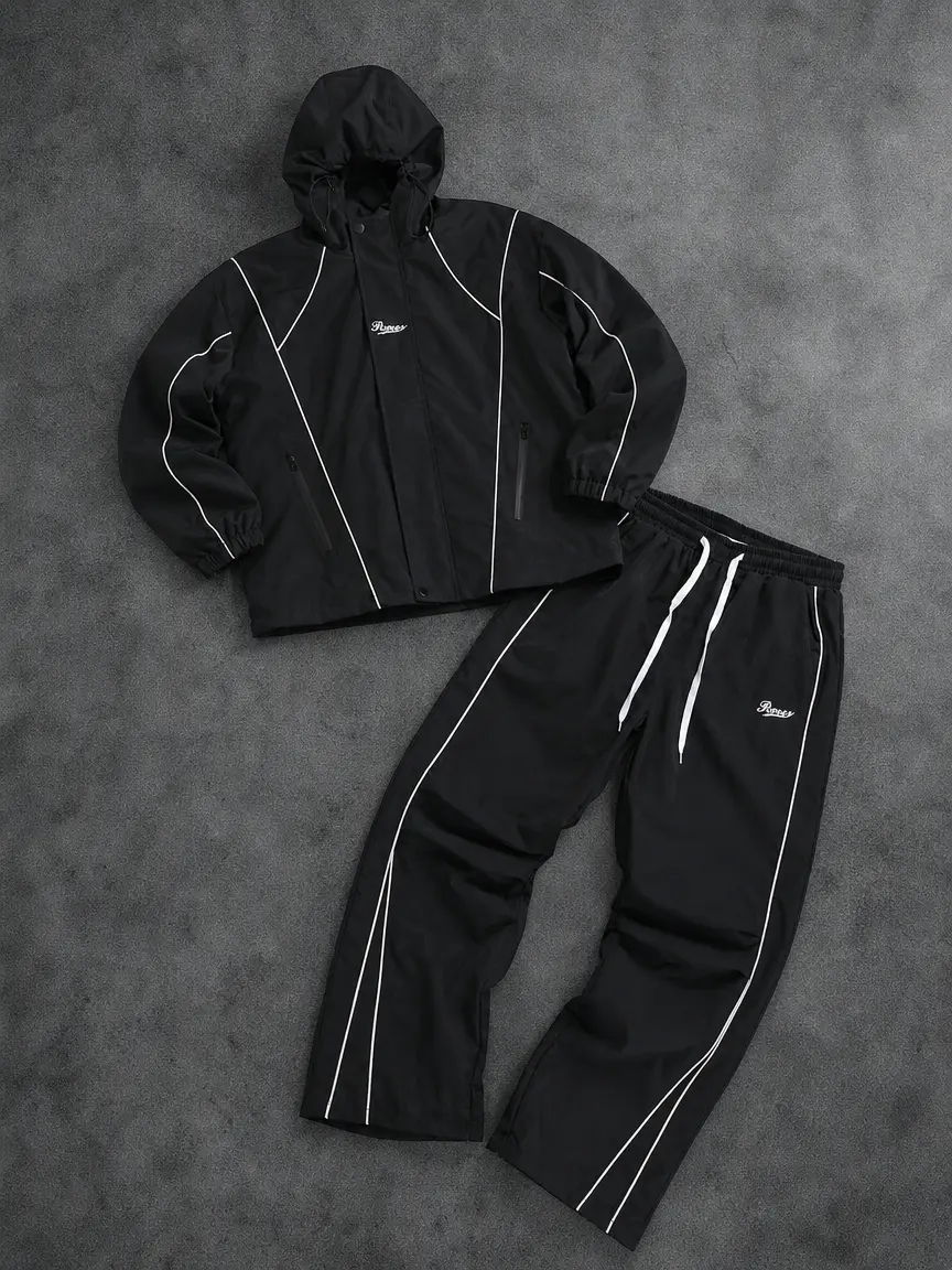Reflective tape embroidered windproof two-piece athletic set featuring a drawstring hooded jacket and elastic-waist wide-leg pants, functional two-piece design.