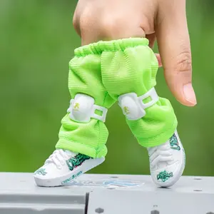 1 pair of mini finger skateboard pants, with knee pads and plastic sneakers - green and white, perfect for table decoration and home party gifts, party favors |   Fun Design |   Plastic material BeyBattle Set Launchers