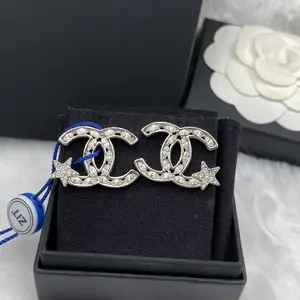 Pre-owned Chanel Silver Metal & Strass Comet Earrings GIA1002