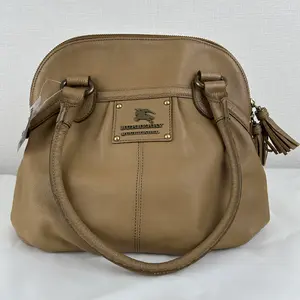 Pre-owned BURBERRY Blue Label Beige Leather Tote Bag with Tassel Charm and Gold Tone Logo Plaque Japan