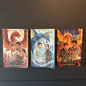 Signed editions of the completed Magic & Marvels triology.