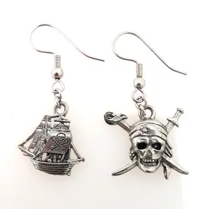 Silver pirate ship and skull charm earrings