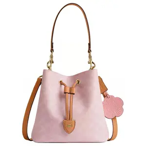 COACH Rowan 21 Valentine’s Limited Edition Classic Monogram Detachable Strap Lucky Bucket Bag for Women, Faux Leather, Crossbody/Shoulder/Handheld, Small, Sakura Pink