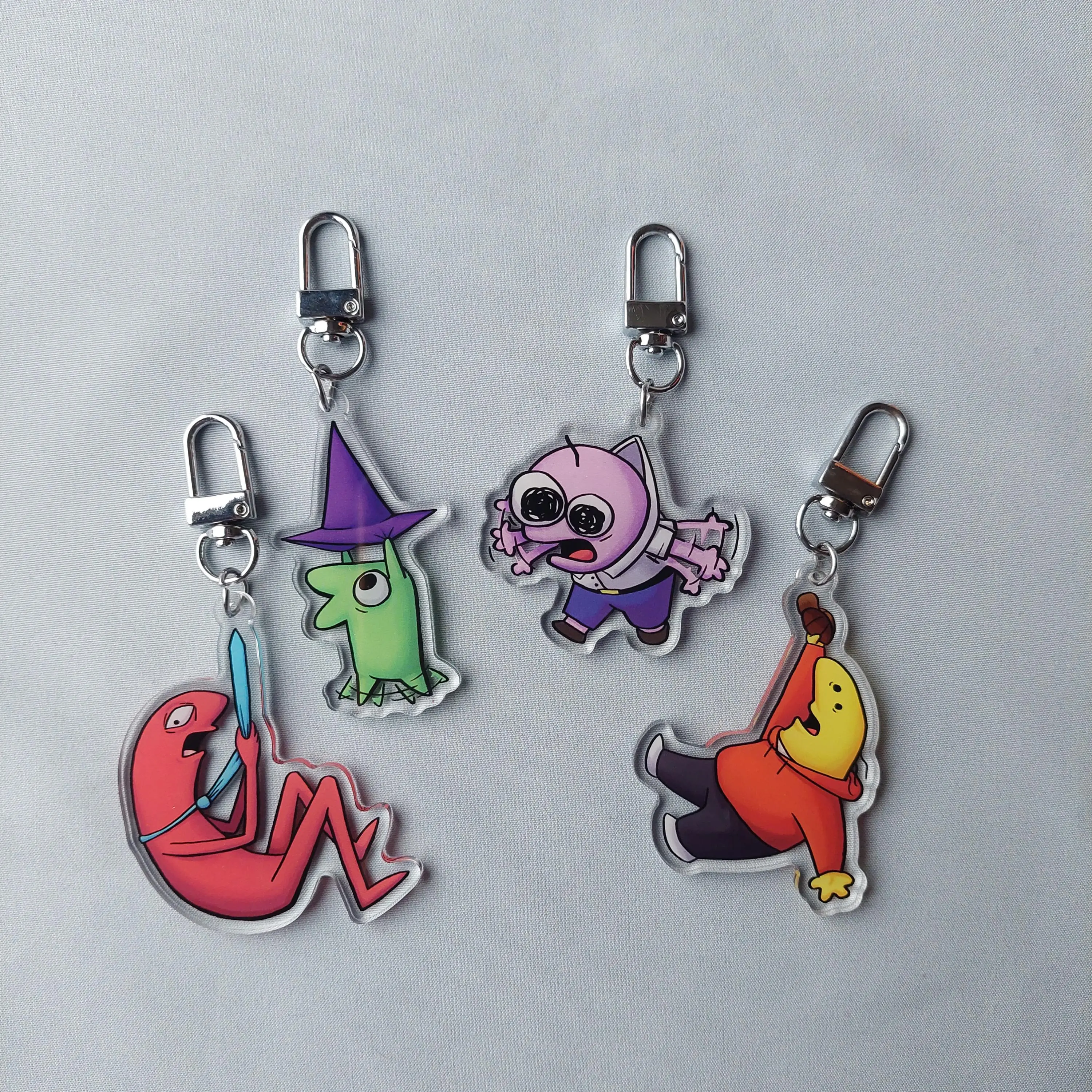 Smiling Friends Keychains! Cute, Durable, And Perfect For Bags, Keys, Or Gifts. Great For Daily Use Or As Thoughtful Little Gifts For Your Friends And Yourself.