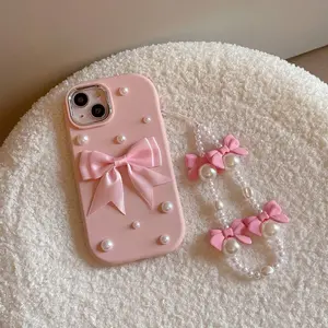 Pink Satin Bow Pearl Case for iPhone 14/15 Series | Soft Pink Silicone Base + 3D Satin Bow + Scattered Pearls + Matching Pearl Lanyard | Shock & Scratch Resistant | Daily Outing/Date Soft Cute Sweet Girl Style