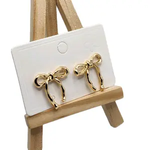Gold Bow Earrings - Elegant Bow Design Stud Earrings, Stylish Accessory for Any Occasion, Gold Jewelry for Casual & Formal Events