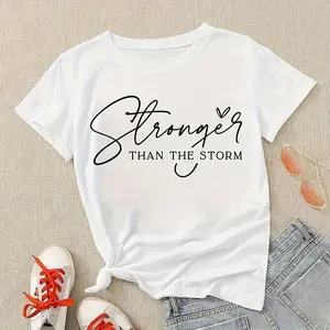 Women's Black Breathable Cotton Crew Neck Short-Sleeve T-Shirt - Comfortable, Casual, Elegant Day Top, Streetwear Aesthetic, Printed "Stronger Than The Storm" Inspirational Quote, Minimalist Script & Heart Design, Denim-Ready Motivational Self-Love Top