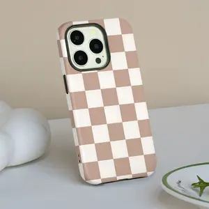 This durable, shock-absorbing matte 2-in-1 phone case features a brown and white checkered pattern and is compatible with iPhone 17, 15, 14, 13, 12, 11, and X series models. It makes a great holiday gift for friends or family.