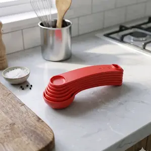 Salmon-colored measuring spoons