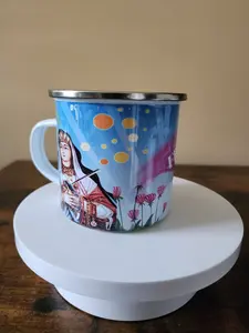 Enamel Sublimation Cups with Vèvè's Symbols Vibrant Design Featuring a Rustic Scene Classic Handle for Distinctive Cultural Appeal