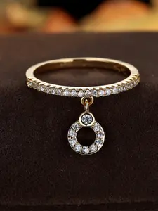 A golden slightly inlaid white zirconia hollowed-out round pendant ring is fashionable, high-end and simple, suitable for women to wear during proposals, travels and daily life