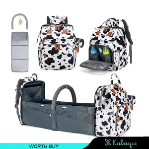 Kabaqoo's Mommy Backpack. with a mosquito net & foldable baby bed. Adjustable straps for comfort. Stow all baby essentials easily.cow.Diaper Bag