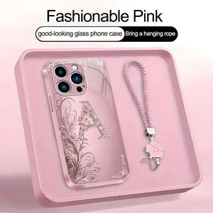 Suitable for [iPhone 14 Pro] high-end women's phone case🤩，a beautiful four-leaf clover lanyard is included🍀，Exquisite floral print, non-3D rhinestones, 26 letters to choose from YM99