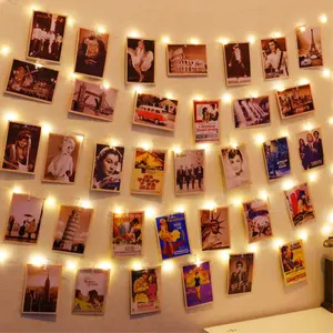 50LEDs Photo String Light, Warm White 16.4Ft   Fairy Light with 52 Clear Clips & 10 Hooks  Wall for  Picture Dorm Bedroom Party