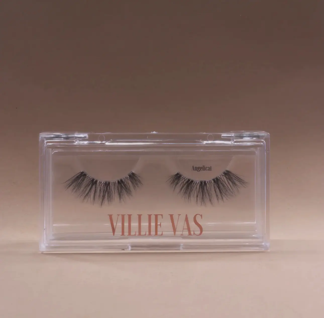 Angelicat Lashes by Villie Vas  A delicate yet alluring lash that serves sophisticated beauty. A 3/4 invisi-band displays an array of delicate faux mink fibers that gradually lengthen and curl making your eyes look sweetly sinful.