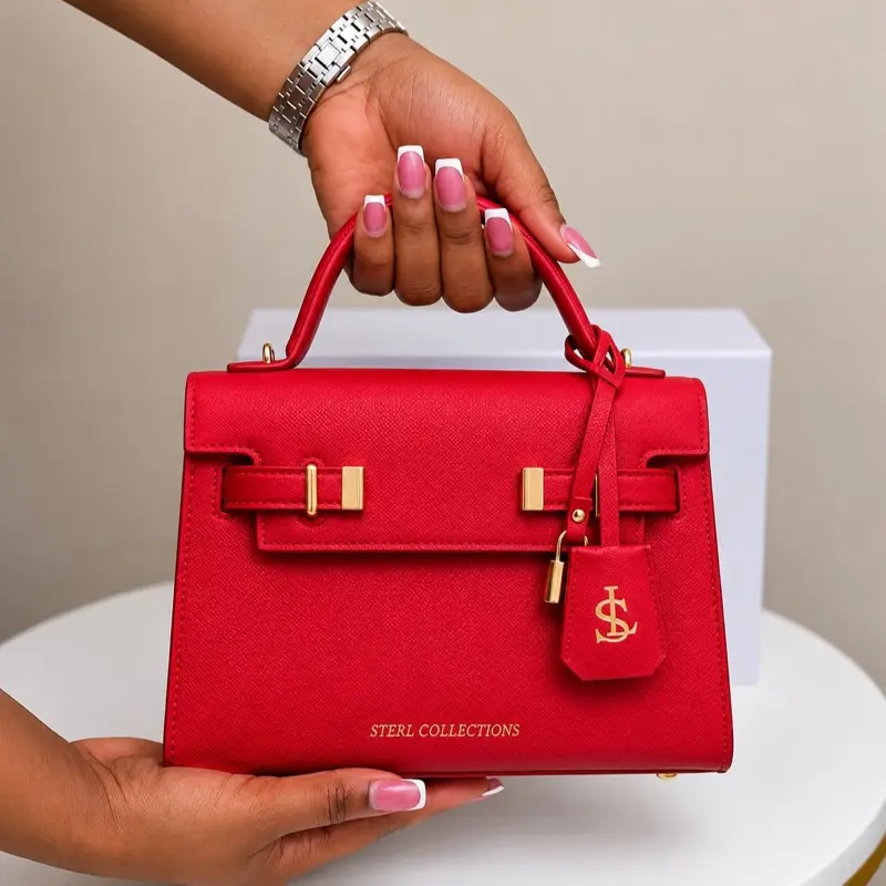 STERCOLLECTIONS Luxury Red Handbags High Quality with a touch of gold and a lot of glamour