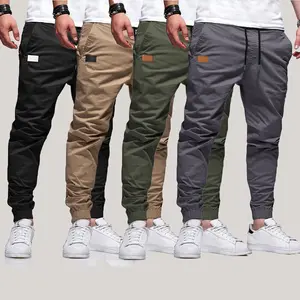 Men’s 3-Pack Casual Jogger Pants – Khaki, Gray & Black – Elastic waistband with drawstring, ribbed cuffs, PU patch detail – Lightweight 100% polyester fabric – Perfect for streetwear, travel, everyday wear – Sizes S–3XL. We recommend choosing one size lar