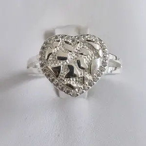 Silver .925 Nugget Ring with Intricate Heart Design and Elegant Cutout Details