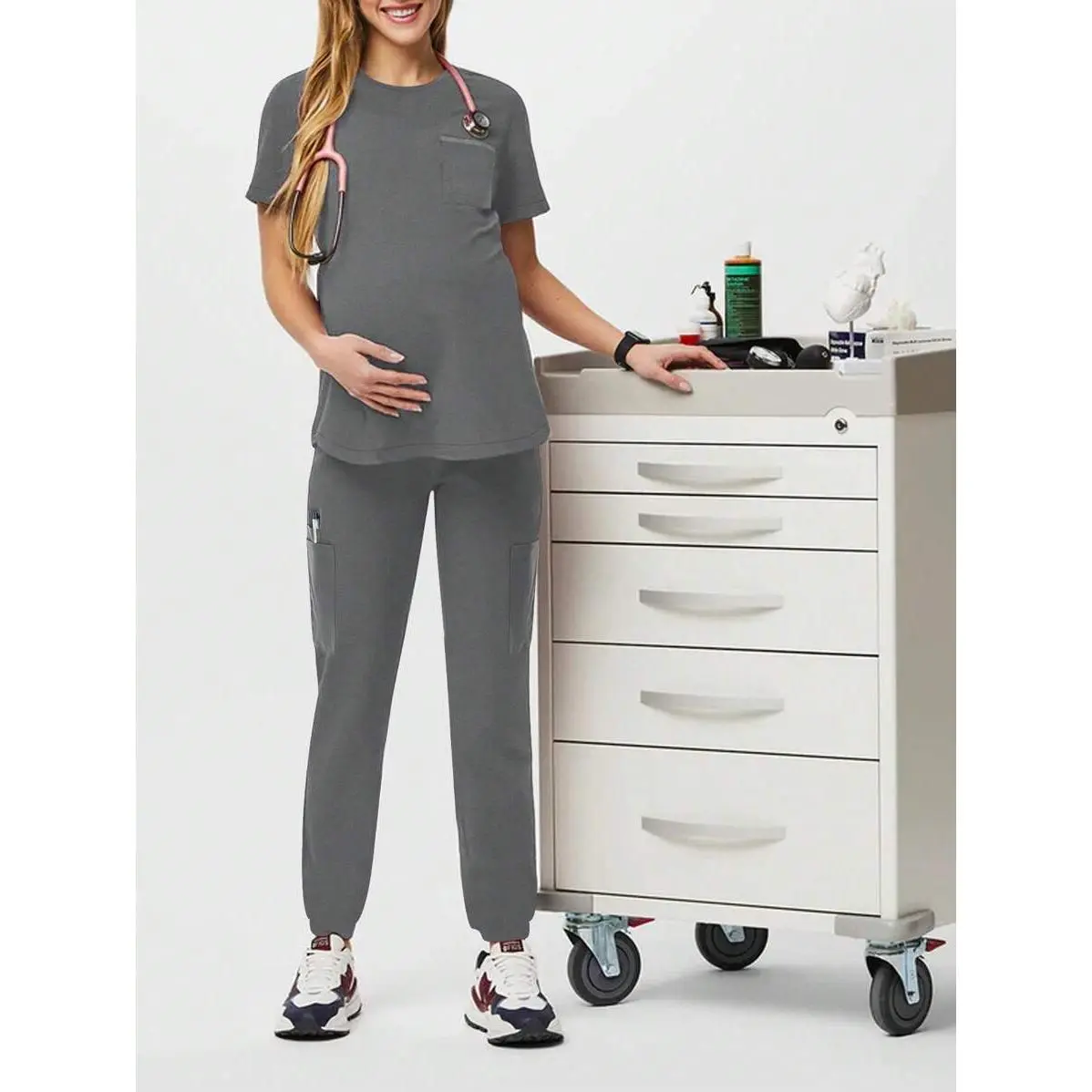 Cimmuovere scrubs for women two-piece set includes a women's round-neck short-sleeved top and a pair of loose-fitting, elastic-waist trousers, suitable for wear in dental clinics, veterinary hospitals, and laboratories scrubs .