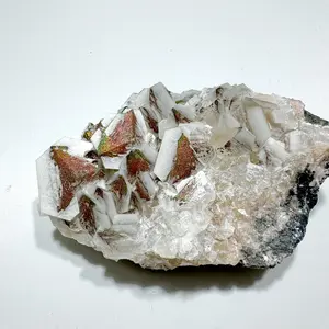 Rainbow pyrite on calcite mineral specimen