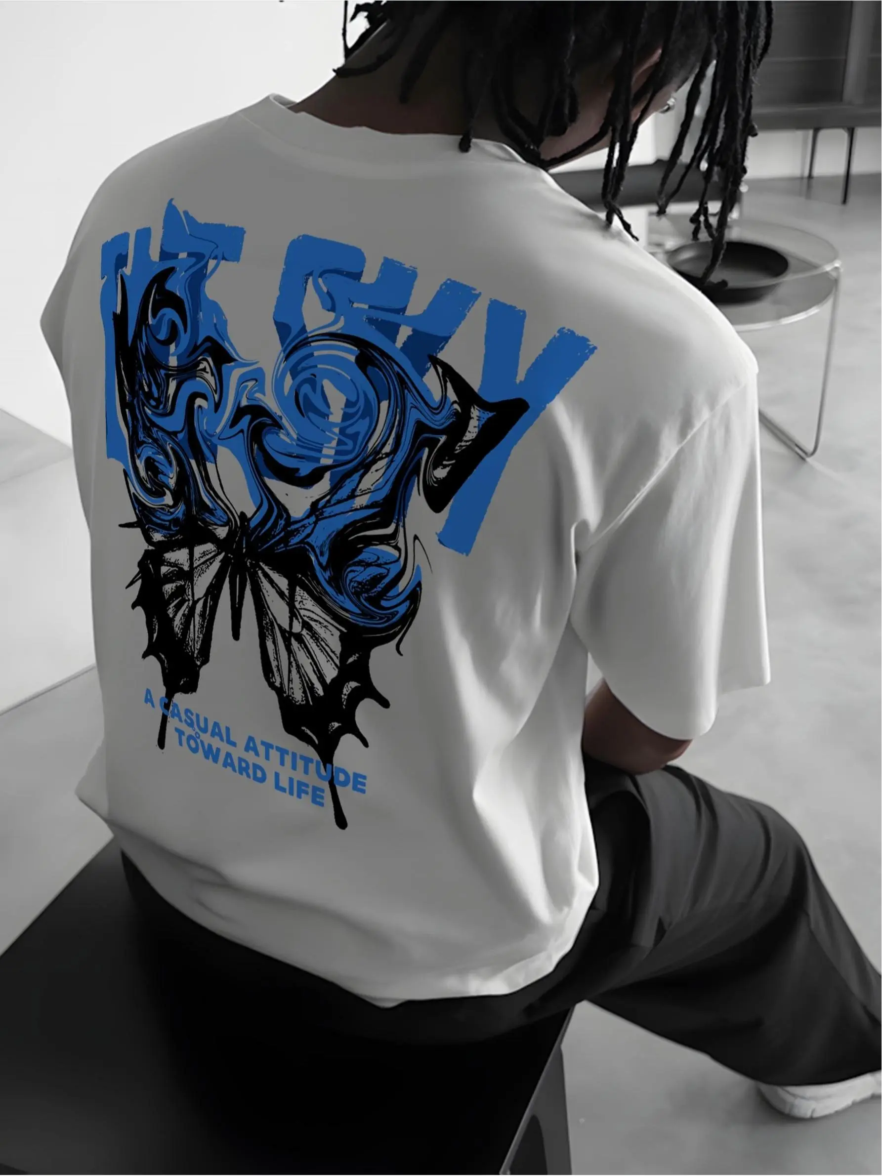"THE SKY," a Trendy and stylish printed street casual short-sleeved T-shirt for young men. Features a crew neck, loose fit, 180g pure cotton, and black and white color options. A must-have for fashion trends.