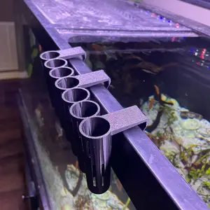 Multi stem plant holder for fish tank propagation and aquaponics