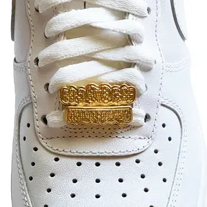Grillz Bling Dubraes custom shoelace tags for all shoes provided by Dubraes