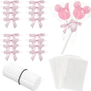 100 Sets Cake Pop Sticks and Treat Bags Kit Including 100 Cakepop Wrappers with 100 Pink Bow Ties and 100 Lollipop Sticks for Rice Krispies Candies Chocolate Wedding Christmas Packaging