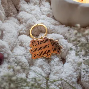 Team Whoever The Villain Is Hard Enamel Keychain