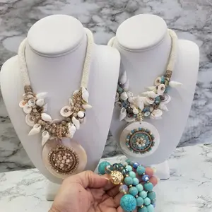 Telma Artisan Necklace with Seashells Beads & Decorative Beads on Tick Cord Large Circular Pendants for Women