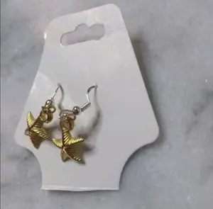 Gold starfish earring