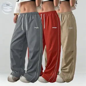 Pack of 1–3 — Women’s lightweight summer sports pants, thin and soft, loose fit in plus sizes! Jogger sweatpants for men, casual long pants with gray side stripes and gold decorative trim, comfortable design, sports-casual style bottoms, gym wear, street