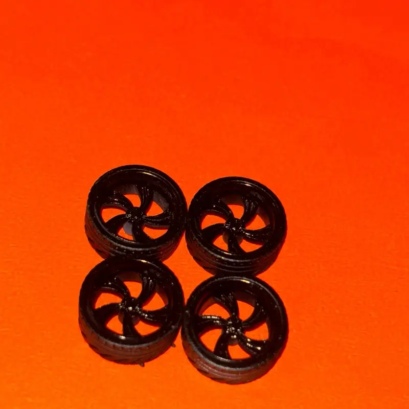 1/64 scale 12x5mm rims (twisted vs black)