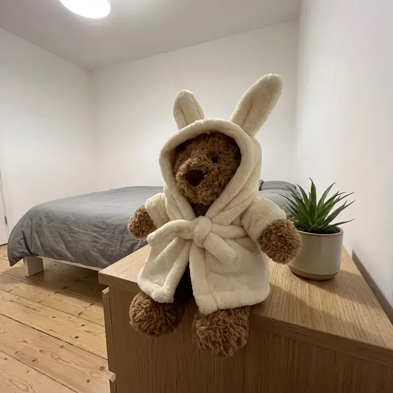 Premium Jellycat Bartholomew Bear wearing a removable bathrobe – a soft plush toy that makes an ideal gift for birthdays, special milestones for you and your loved ones, or as a home décor piece