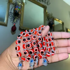 Red eye bracelet with charm