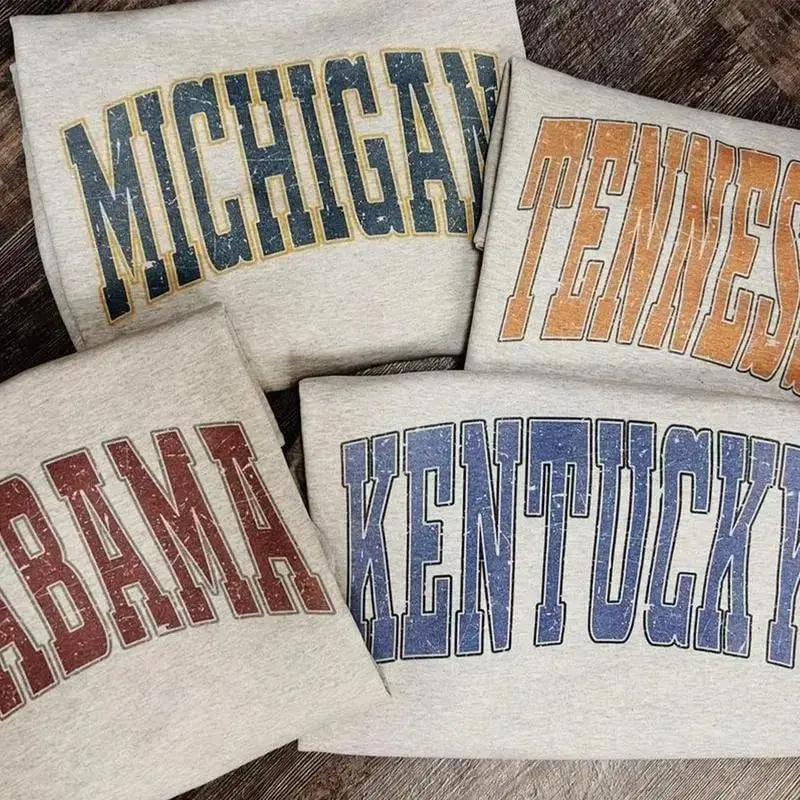 Distressed Varsity College Sweatshirt – Ash Grey, unisex classic fleece pullover with a vintage athletic look, perfect for casual layering
