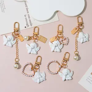 Vintage Angel Keychain – Romantic Pearl Heart Charm for Girls – Aesthetic Phone Case, Bag or Car Pendant Accessory